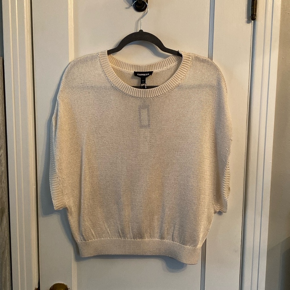 Express cable knit sweater.